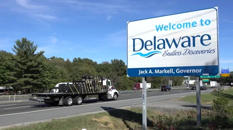 Interstate traffic passing the Delaware border Stock Footage 69036892