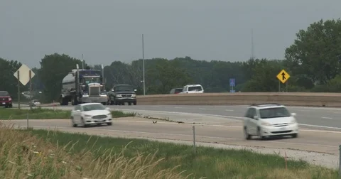 Interstate Traffic - Semis - On Ramp Stock Footage 77893986
