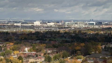 Interval recording of clouds casting dark areas over foreground. EX20175 Stock Footage 97847497