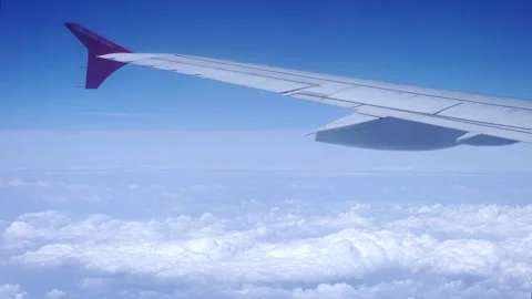 Interval shooting: a plane flying over the clouds Video stock 246878060