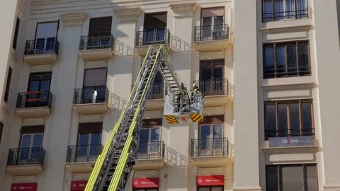 Intervention of firefighters in the town hall square of Valencia Stock Footage 102791243
