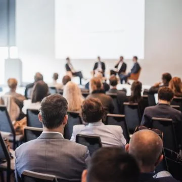 Interview and round table discussion at business convention and presentation Stock Photos