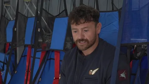 Interview with British parachute instructor ahead of Macron State Visit Stock Footage 312677322