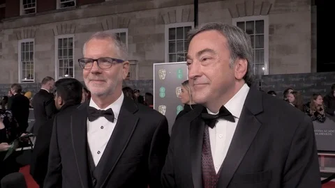 Interview with Chris Buck and Peter Del Vecho at red carpet, BAFTAs - 2020 Video stock 125801446