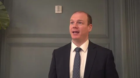 Interview with communities minister Gordon Lyons in Washington DC Stock Footage 304080434