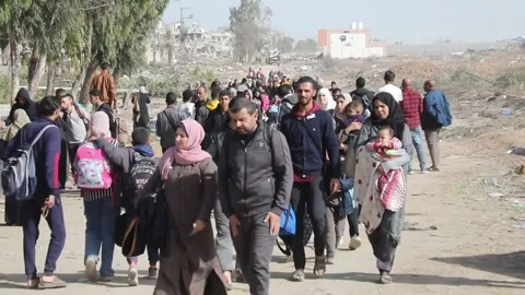 Interview With Displaced People Who Head South of Gaza Stock Footage 256912334