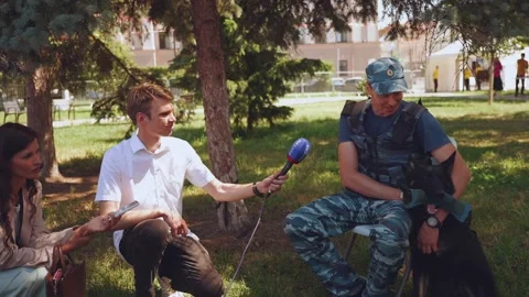 Interview with a dog handler Stock Footage 278305100
