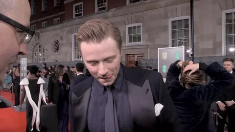 Interview with Jack Lowden at red carpet during BAFTAs - London 2020 Stock Footage 125801683