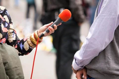 Interview with microphone Stock Photos