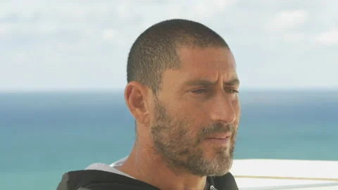 Interview with pro surfer David Langer about eating to recover lost energy Stock Footage 157212123