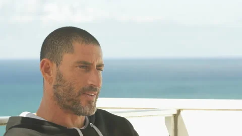 Interview with pro surfer David Langer about anticipation before big waves Stock Footage 157212414