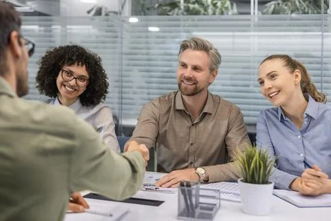 The interview process takes place in the office. It includes a meeting with.. Stock Photos