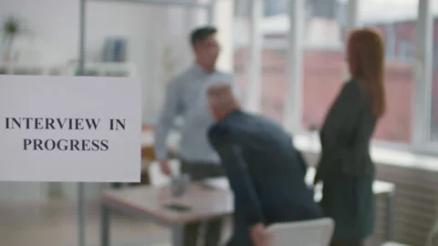 Interview in Progress Sign on Glass | Stock Video | Pond5