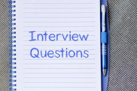Interview questions write on notebook Stock Photos