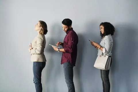 Interview, queue and people on wall with tech, recruitment selection and hi.. Stock Photos
