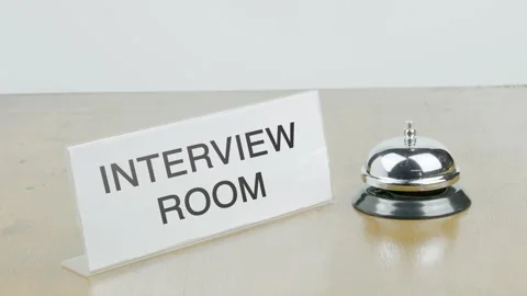Interview Room Office or Room with Hand Ringing The Bell on Desk or Table Stock Footage 300738328