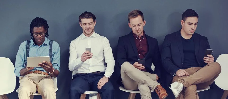 Interview, row and men with tech in waiting room for job opportunity, onlin.. Foto stock