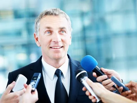 Interview, senator and feedback with man and microphone for journalist, politica Fotos Stock