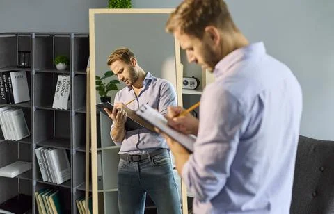 Interview speech preparation, business presentation rehearsal of man by mirror Stock Photos