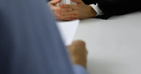 Interviewer and candidate discussion in a job interview Stock Footage 117474885