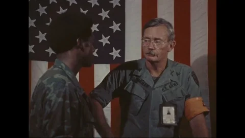 Interviewer ask question to Colonel during interview - 1973 스톡 동영상 99907993