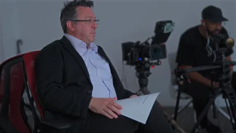 Interviewer Preparing for Commercial Interview Shoot Video stock 325836552
