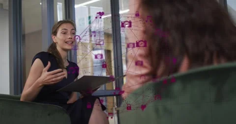 Interviewer referencing gray folder and starting business talk, purple icons Stock Footage 329836391