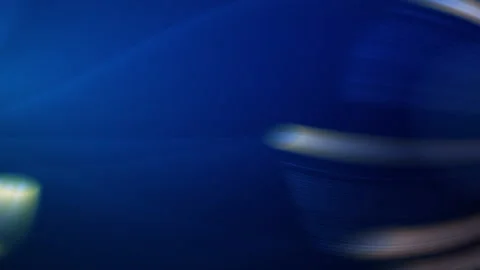 Interwoven bright broken rays deep blue background Stock Footage 225743908