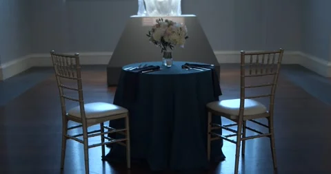 An intimate and minimalist wedding table setting for two, complete with a Stock Footage 333959004
