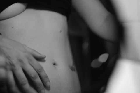 Intimate Close-Up of Midsection in Black and White Stock Photos