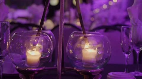 Intimate Dining Ambiance Created By Luminous Votive Candles In Crystalware Under 스톡 동영상 323771701