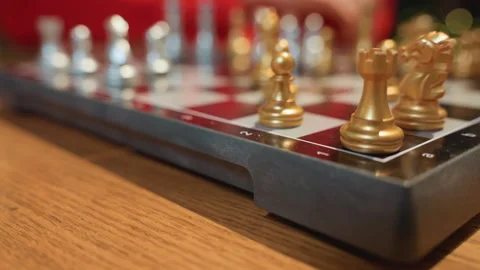 Intimate game setting. Focused chess piece placement. Chess hand positions on 스톡 동영상 345172286