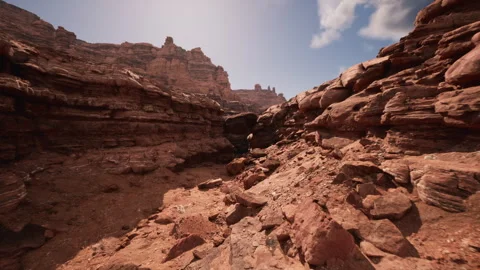 Intimate passage through shadowed sandstone canyon with crevice Stock Footage 331521448
