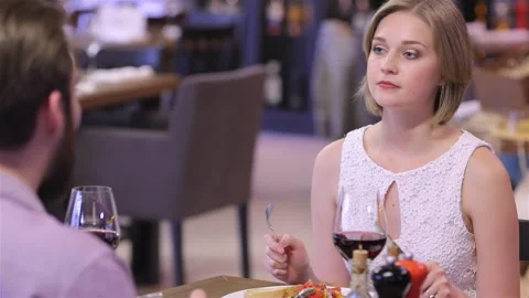 Intimate romantic dinner for two in a cozy restaurant Stock Footage 311674488