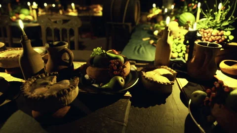 Intimate setting featuring pies with glowing crusts and toppings Stock Footage 341588236