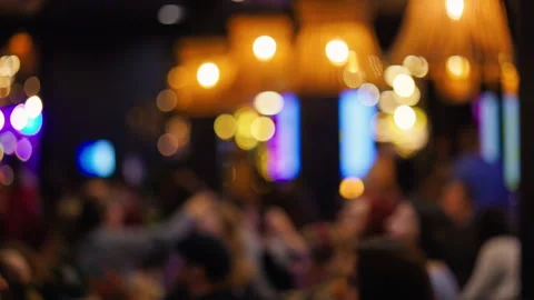 Intimate setting with soft lighting, Chic restaurant scene featuring gentle 스톡 동영상 325453035