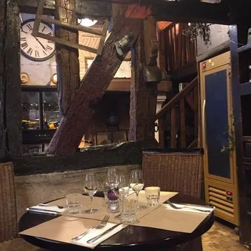 Intimate Table Setting Inside Traditional Parisian Restaurant Stock Photos