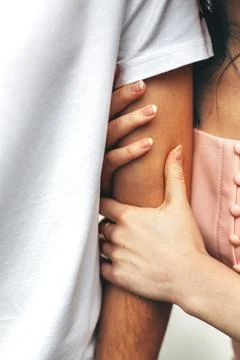 Intimate Touch: Close Up of Two People Embracing Stock Photos