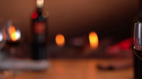 Intimate, warm atmosphere with slow motion toast with red wine Video stock 63377122