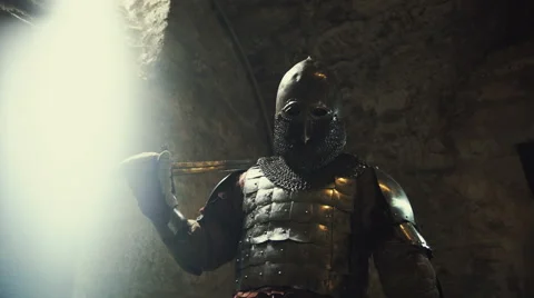 Intimidating warrior in armor holding sword Stock Footage 68321695