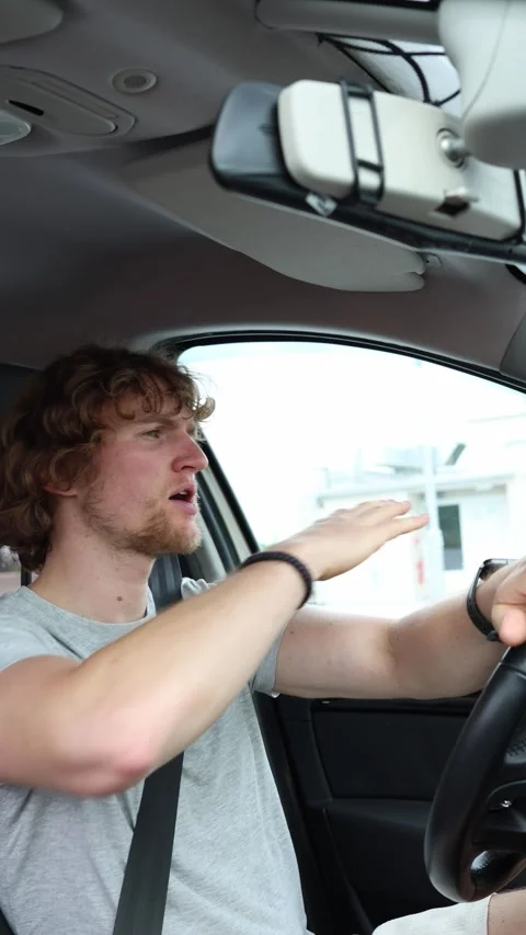 Intoxicated driver looks disoriented with poor coordination behind the wheel Stock Footage 342922729