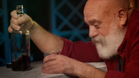 Intoxicated middle-aged man copes with problems through alcohol addiction Stock Footage 346714149