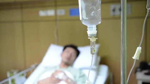 Intravenous drip man, face out of focus Video stock 41150331