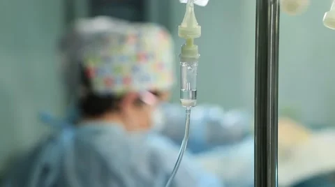 Intravenous Drip With Surgeons Stock Footage 48711347