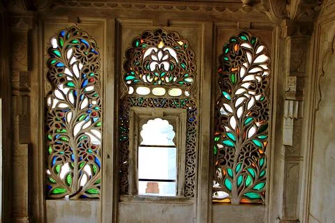 The intricate and decorative etching of floral design on window panes at City Stock Photos