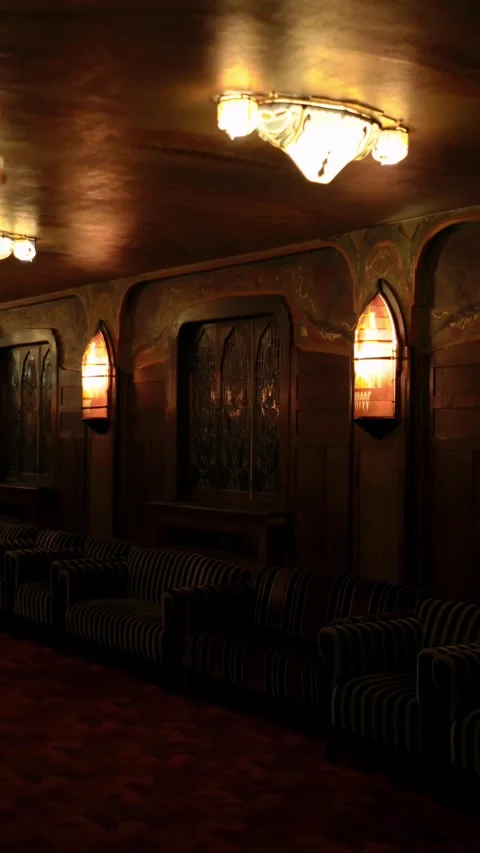 Intricate Art Deco design elements and plush seating captured in Tuschinski Stockbeeldmateriaal 333404232