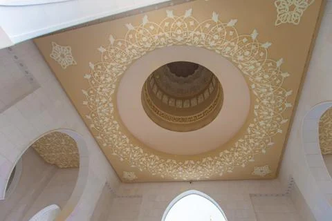 Intricate ceiling design featuring geometric patterns in a grand architectu.. Stock Photos