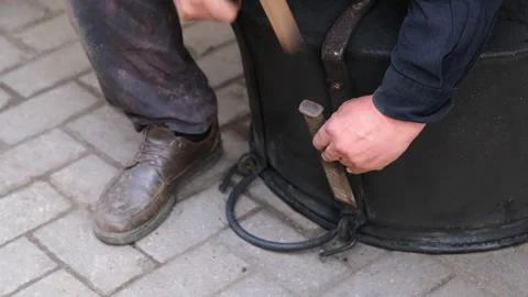The intricate craftsmanship captured in the metalworking process Stock Footage 322965336