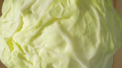The intricate details of a green cabbage. Macro video Stock Footage 244801232