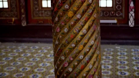 Intricate Floral Patterns on an Ornate Pillar at the Marble Throne Terrace Stock Footage 332625931